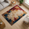 Floral abstract chenille rug with red, gold, and blue oriental border, soft beige center, washable non-slip backing, perfect for vintage and elegant decor.