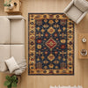 Aztec-inspired chenille rug with oriental influence, navy background, red and gold tribal geometric motifs, washable non-slip backing, perfect for boho and rustic decor.