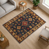 Aztec-inspired chenille rug with oriental influence, navy background, red and gold tribal geometric motifs, washable non-slip backing, perfect for boho and rustic decor.