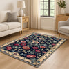 Vintage French floral tapestry rug with black background, ornate red and cream flowers, and antique cream border, washable chenille carpet for elegant home decor.