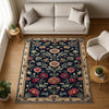 Vintage French floral tapestry rug with black background, ornate red and cream flowers, and antique cream border, washable chenille carpet for elegant home decor.
